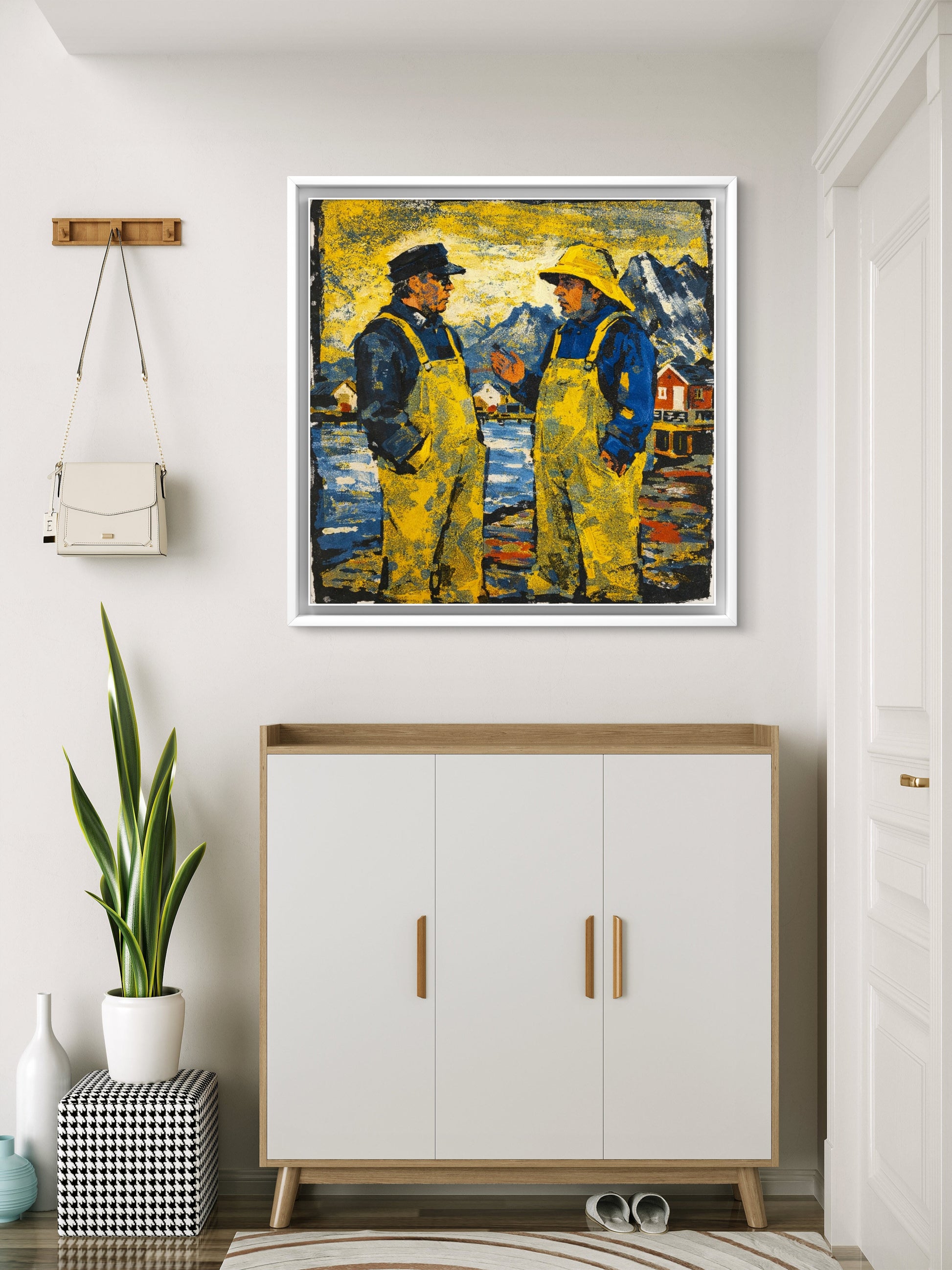 Bildet henger i gangen over en skokommode